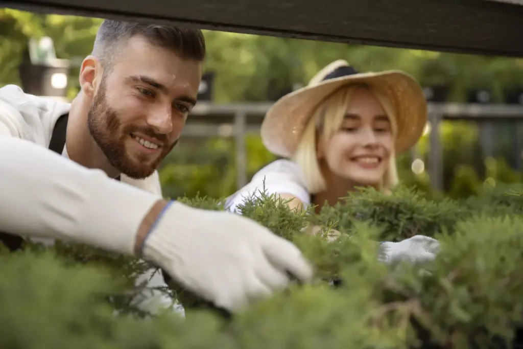 close-up-smiley-people-greenhouse - Village Green Landscaping